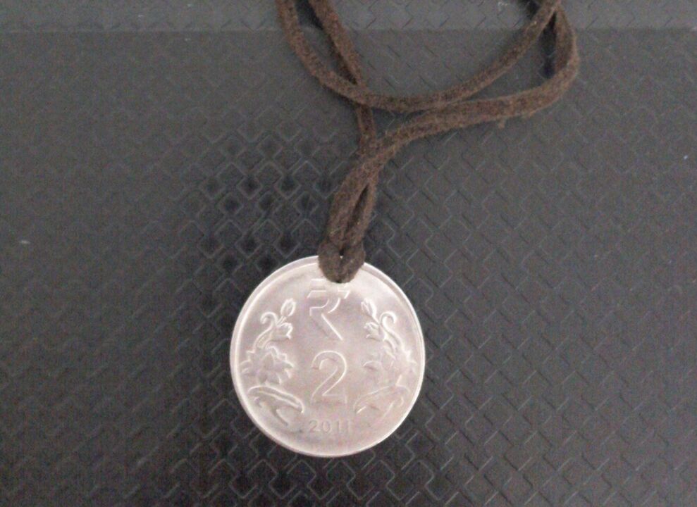 Amulet coin to attract money